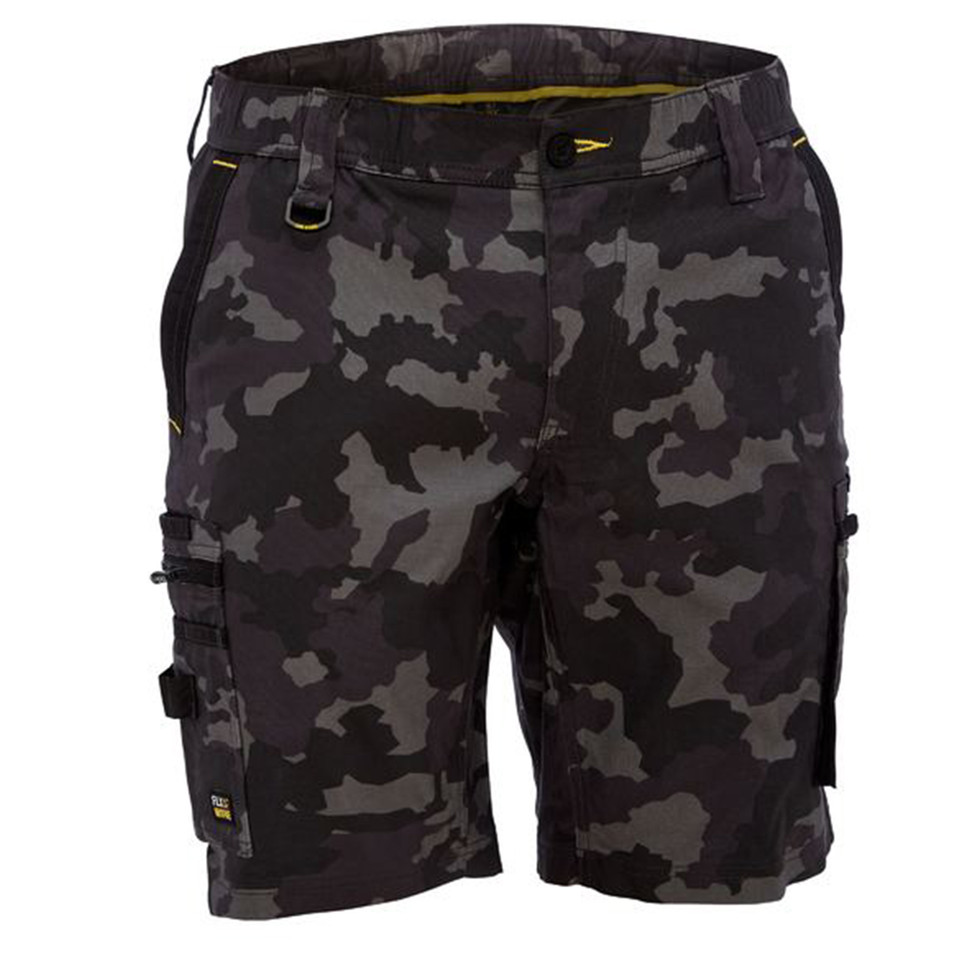 Dark camouflage cargo shorts with utility pockets and yellow interior waistband detail