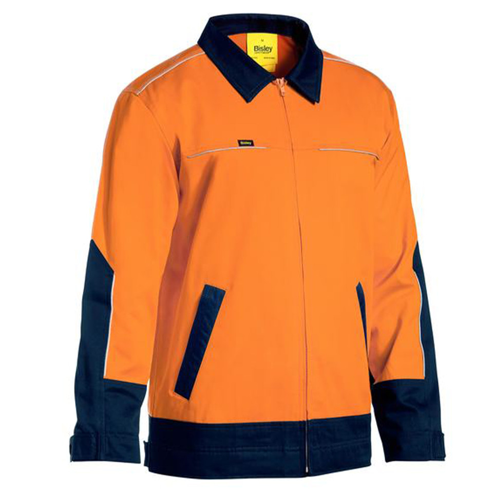 Hi-vis orange drill jacket with navy collar, contrast navy panels on sleeves and hem, chest pockets with piping detail