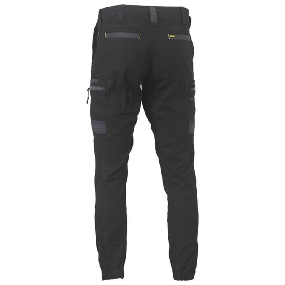 Black stretch cargo pants with cuffed ankles, cargo pockets, and charcoal contrast reinforcement panels