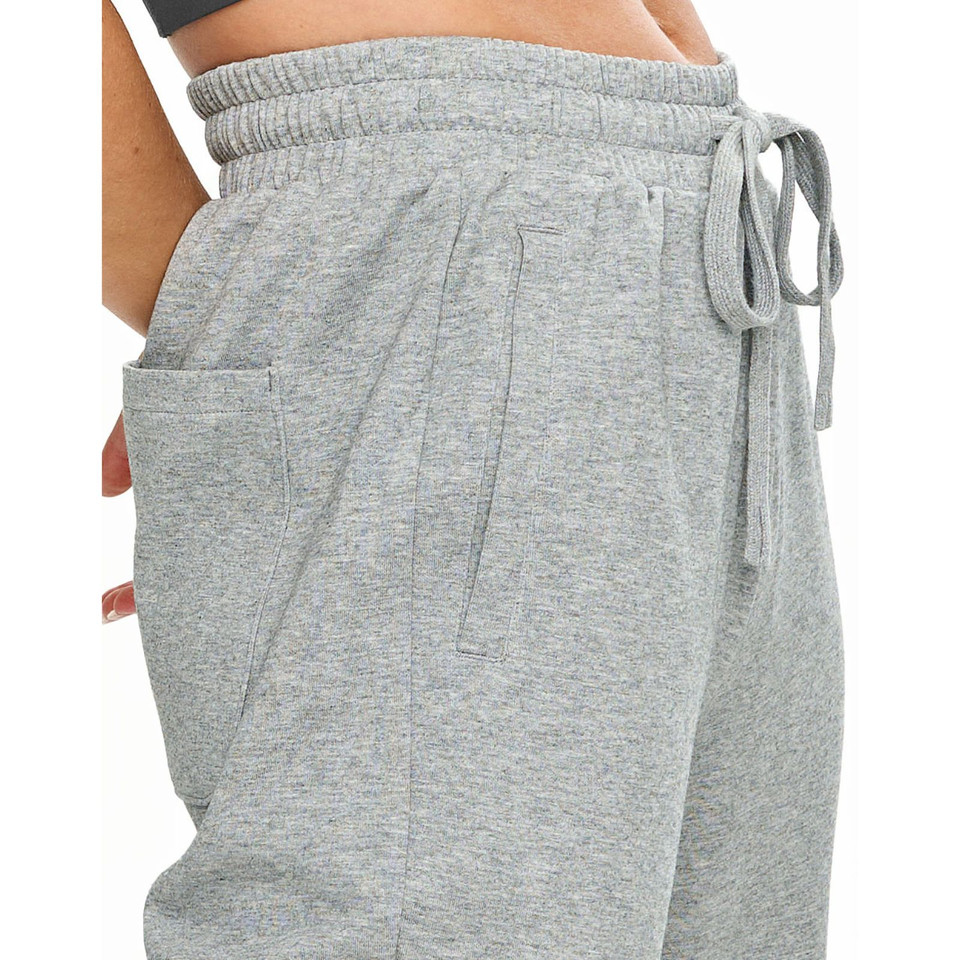 Grey marle track pants with elasticated waistband, side pockets and drawstring ties