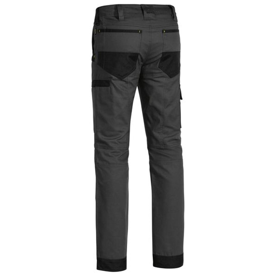 Charcoal work pants with black knee reinforcement panels and cargo pocket, rear view showing contrast detailing