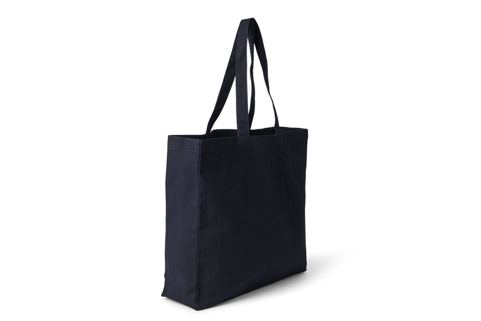 Black heavy cotton canvas tote bag with long handles and gusseted sides shown at angle