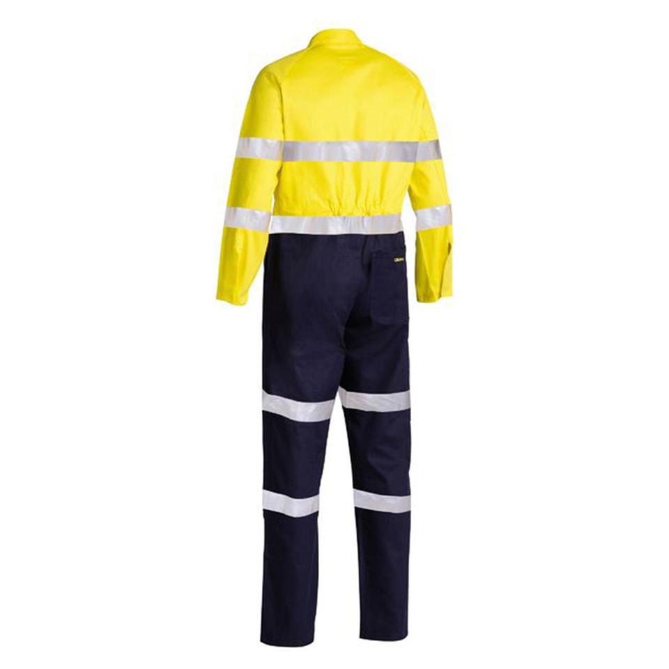 Yellow and navy hi vis drill coverall rear view with reflective biomotion tape on torso and legs