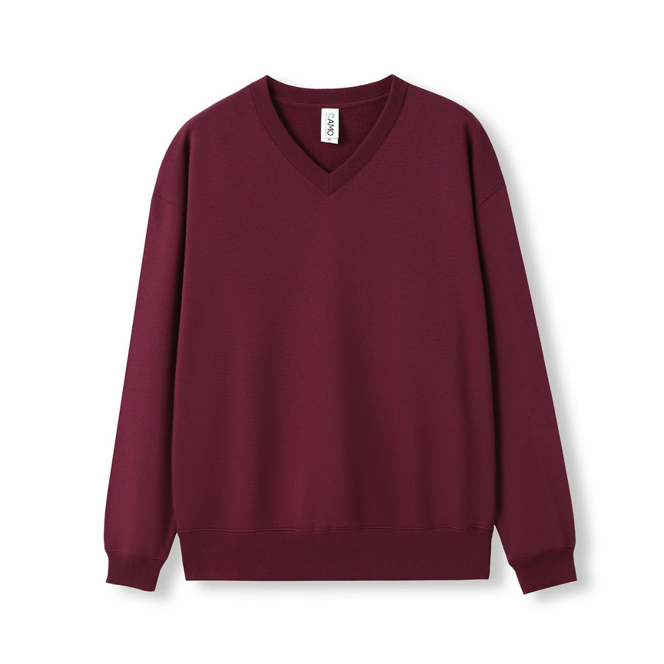 Maroon v-neck fleece sweater with ribbed cuffs and hem on white background