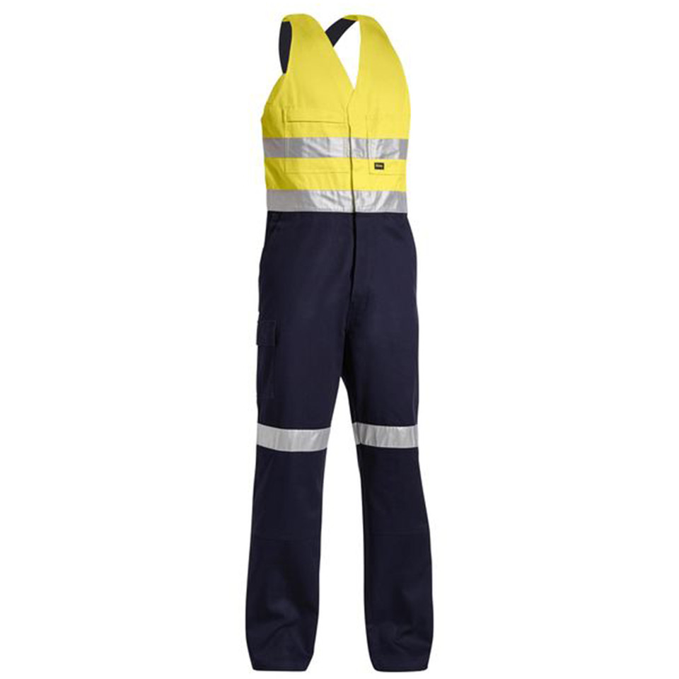 Hi-vis yellow and navy action back overall with silver reflective tape on torso and legs