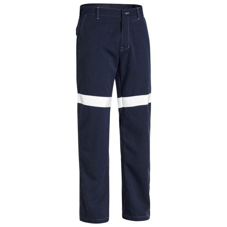 Navy blue flame resistant work pants with horizontal white reflective tape at knees