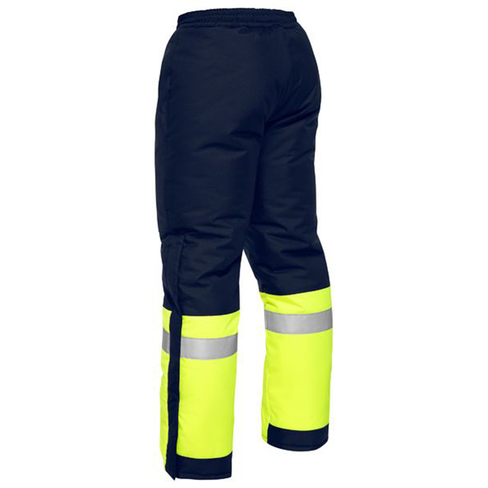 Navy and hi-vis yellow freezer pants with reflective tape on lower legs viewed from behind