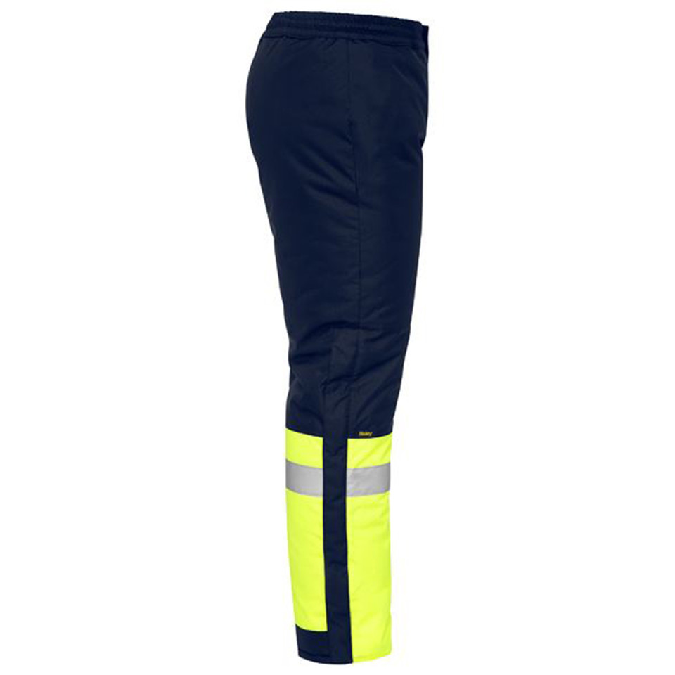 Navy work pants with fluoro yellow lower legs and reflective silver tape at ankle