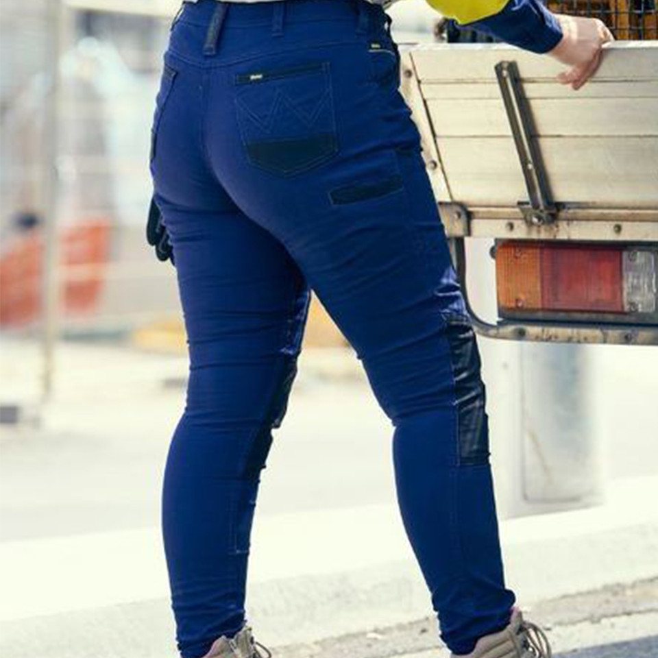 Navy blue women's work pants with reinforced knee panels and multiple cargo pockets
