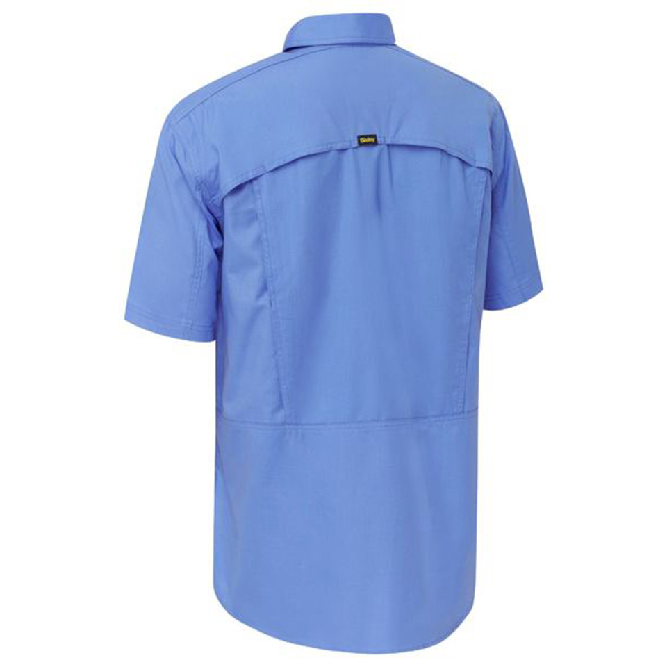 Periwinkle blue work shirt back view with short sleeves, ventilated mesh panel detail and reinforced yoke seam