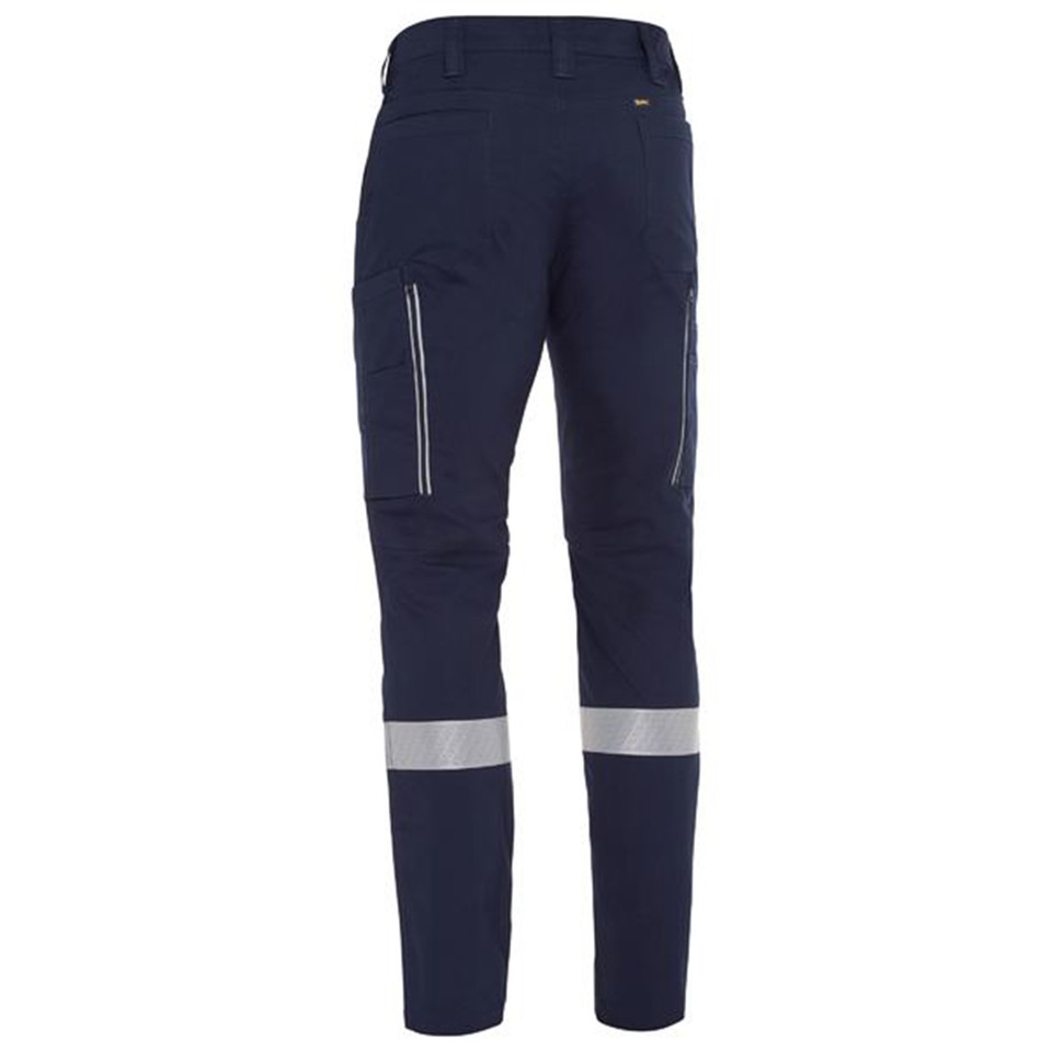 Navy stretch ripstop cargo pant rear view showing reflective tape bands, zipped vents, and cargo pocket