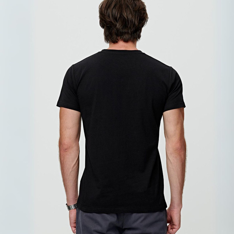 Back view of male model wearing a black crew neck tee with smooth fabric and clean seams