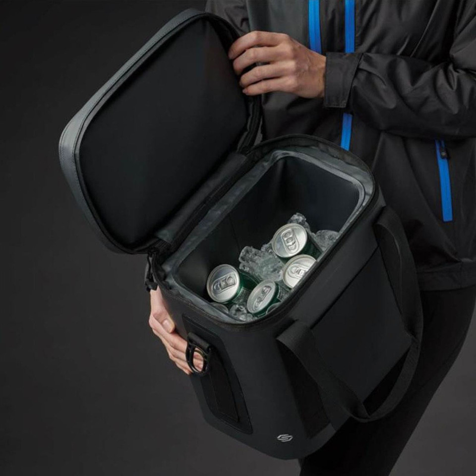 Charcoal black structured cooler bag held open to reveal iced cans inside, rigid lid and padded exterior panels