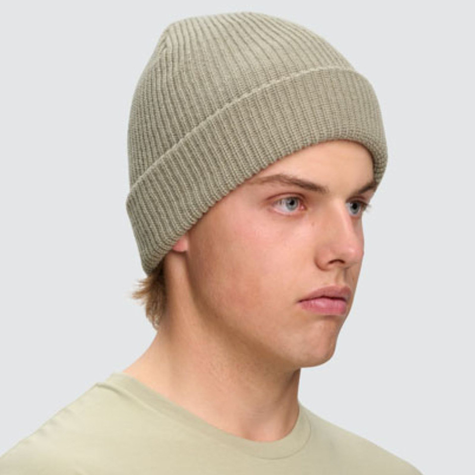 Roll Up Cable Knit Snug Beanie, a comfortable, warm winter hat with a thick cable knit texture and roll-up cuff.