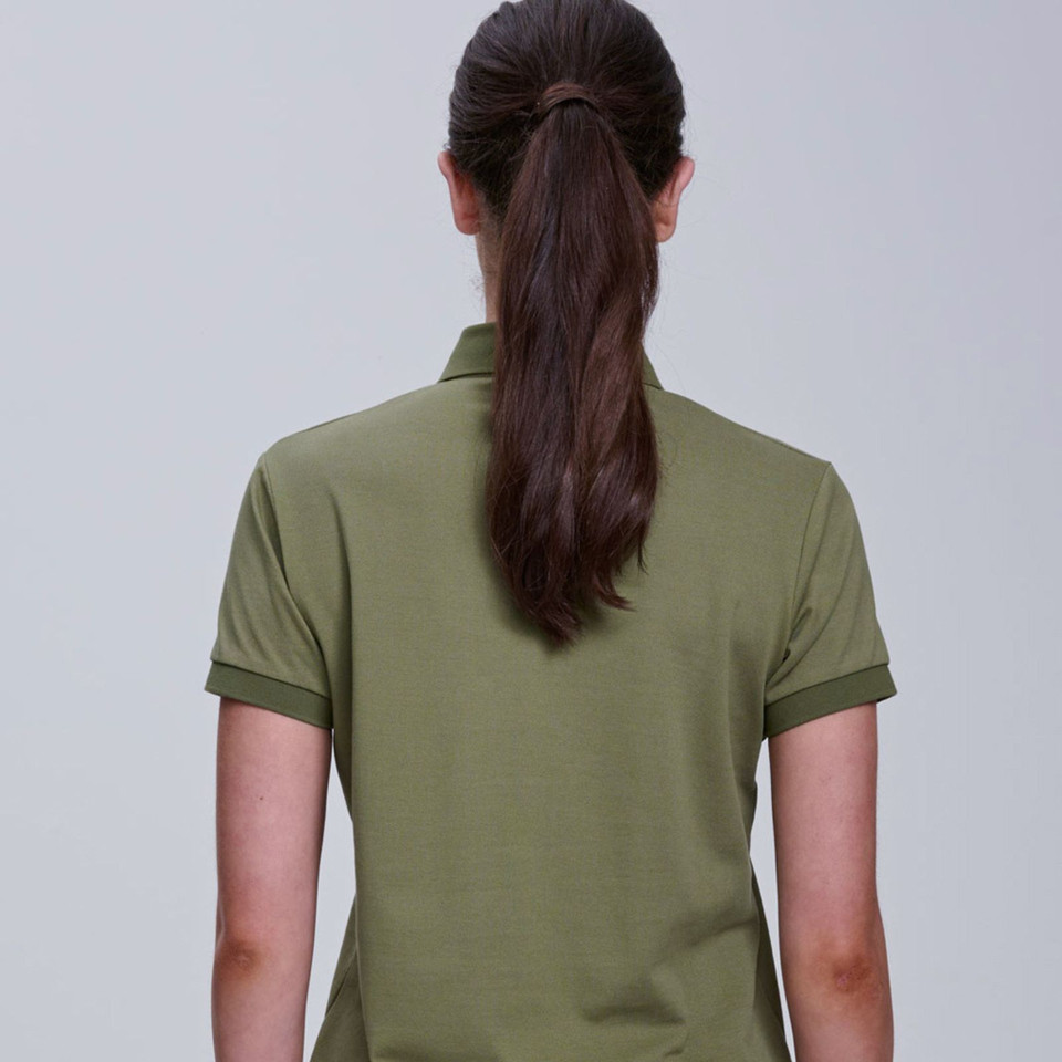 Back view of olive green pique polo shirt with contrasting darker green sleeve cuffs and collar