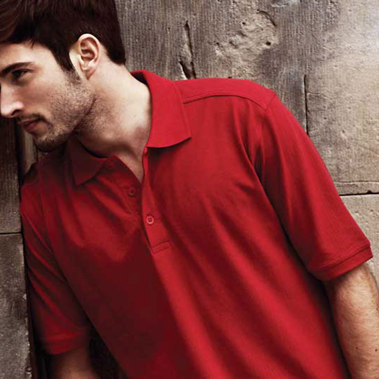 Rich red cotton pique polo shirt with button placket and ribbed collar shown on male model
