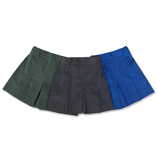 Three girls box-pleat school shorts flat lay in bottle green, charcoal, and royal blue