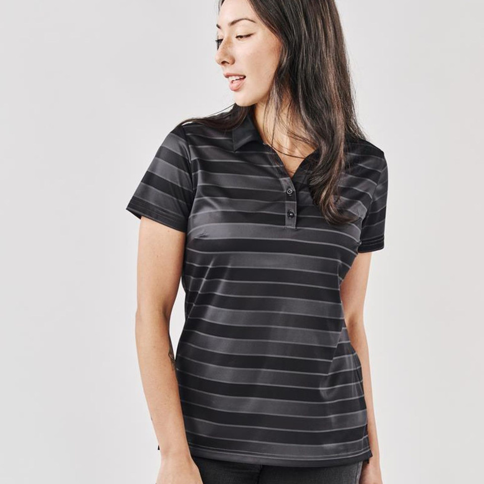 Woman wearing charcoal and black tonal striped performance polo with two-button placket and short sleeves