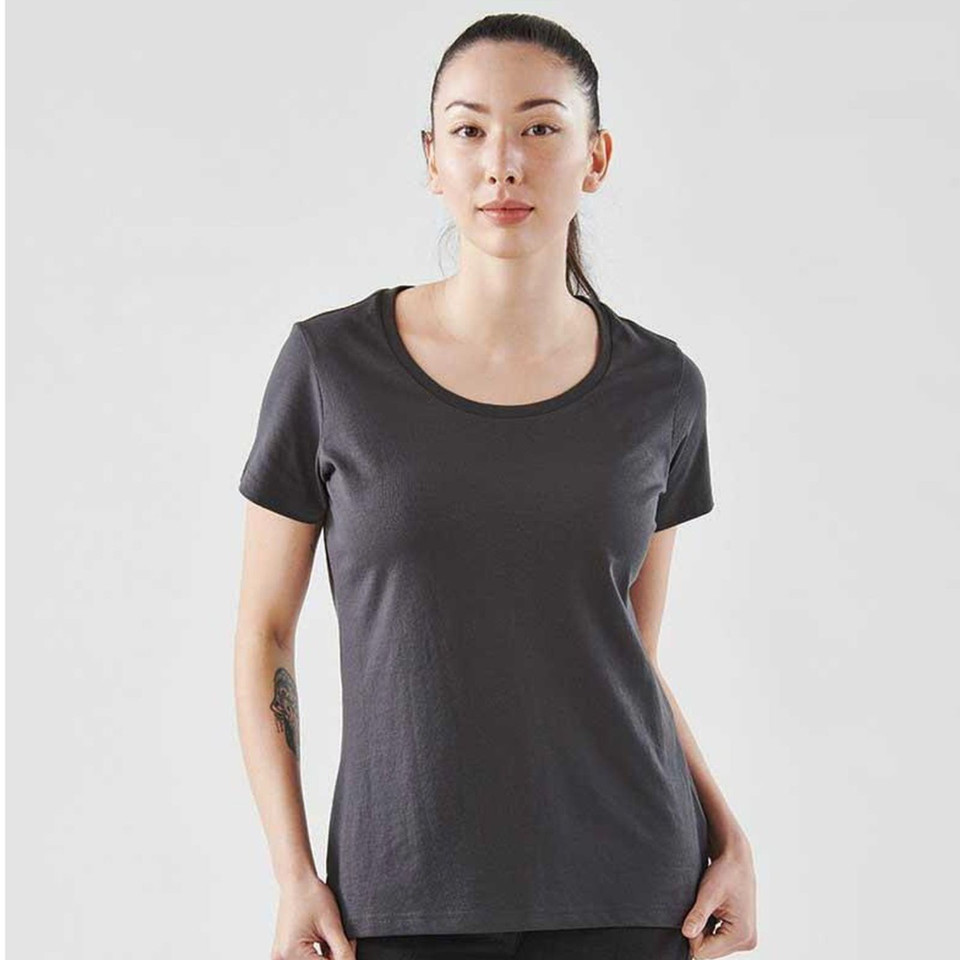 Woman wearing a charcoal grey scoop-neck short sleeve tee with smooth flat front panel