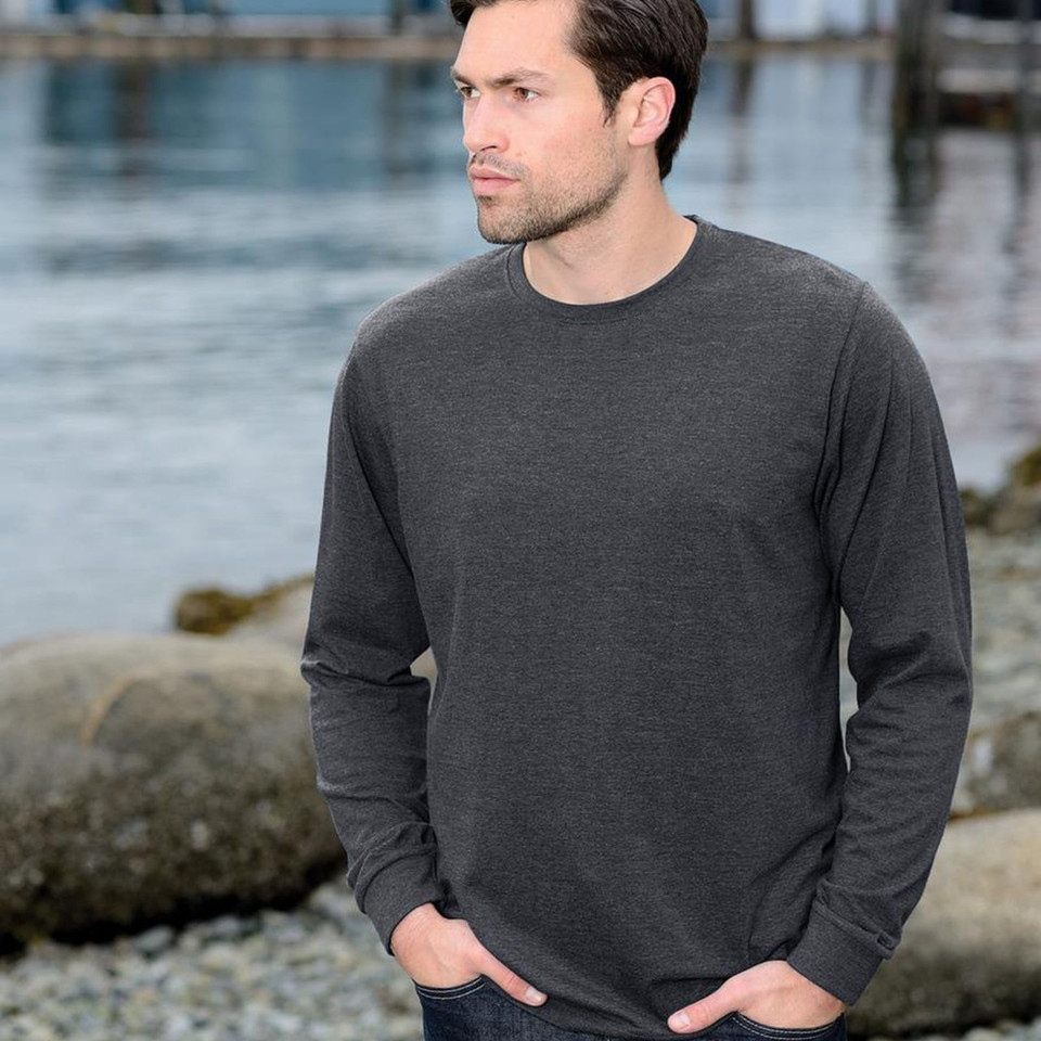 Man wearing charcoal marle long sleeve crew neck tee near waterfront, smooth flat chest panel