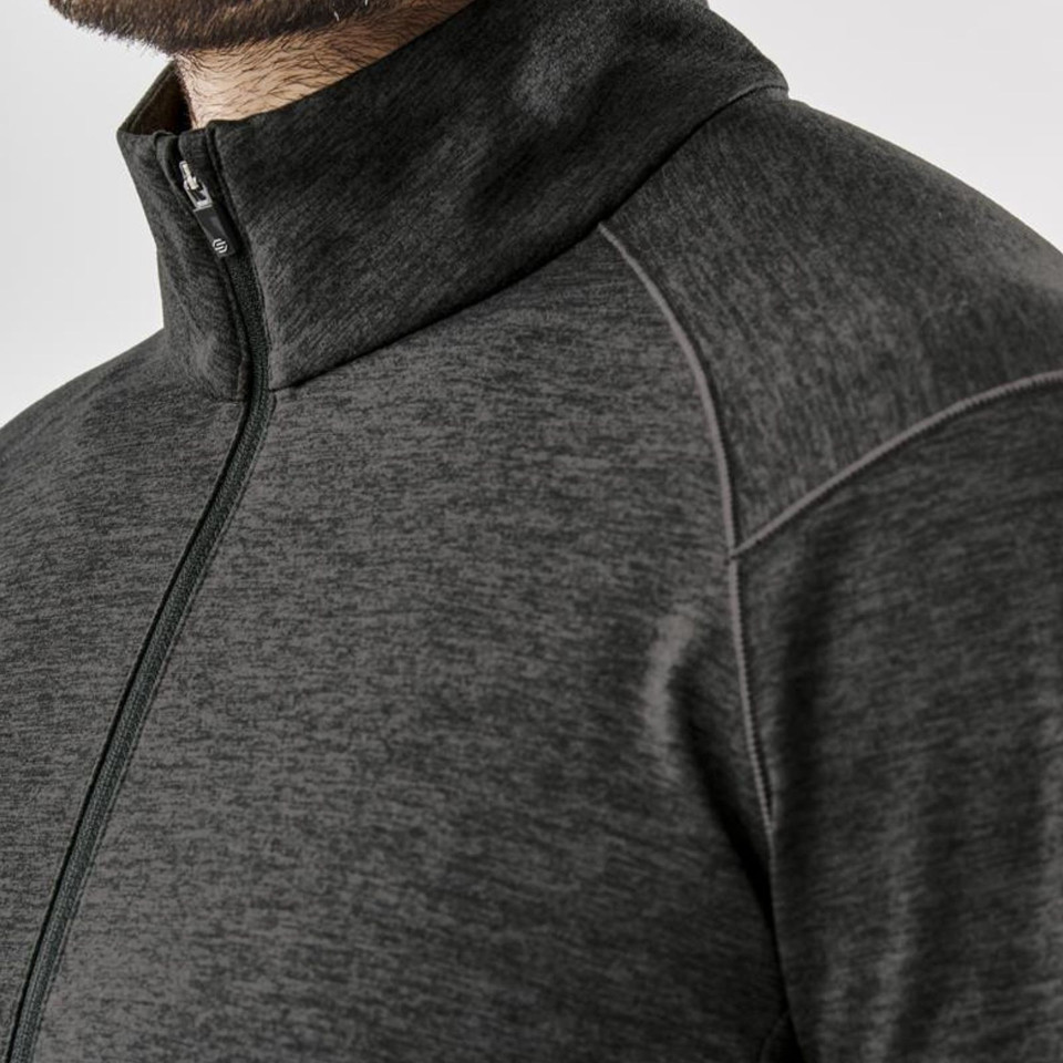 Close-up of charcoal marl full-zip performance jacket with high collar and raglan shoulder seam detail