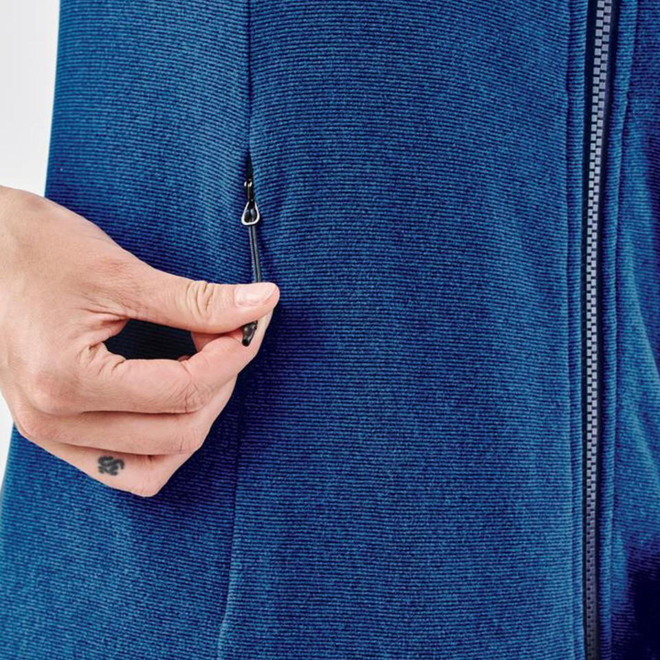 Close-up of hand opening zip chest pocket on steel blue marled fleece vest with contrast zip placket