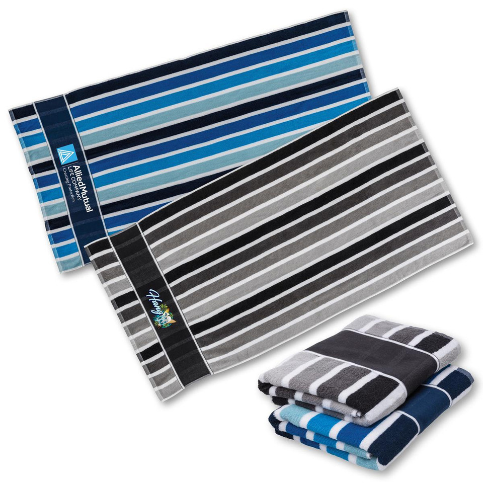 Striped terry beach towels in blue and charcoal colourways with branded woven label, shown flat and folded