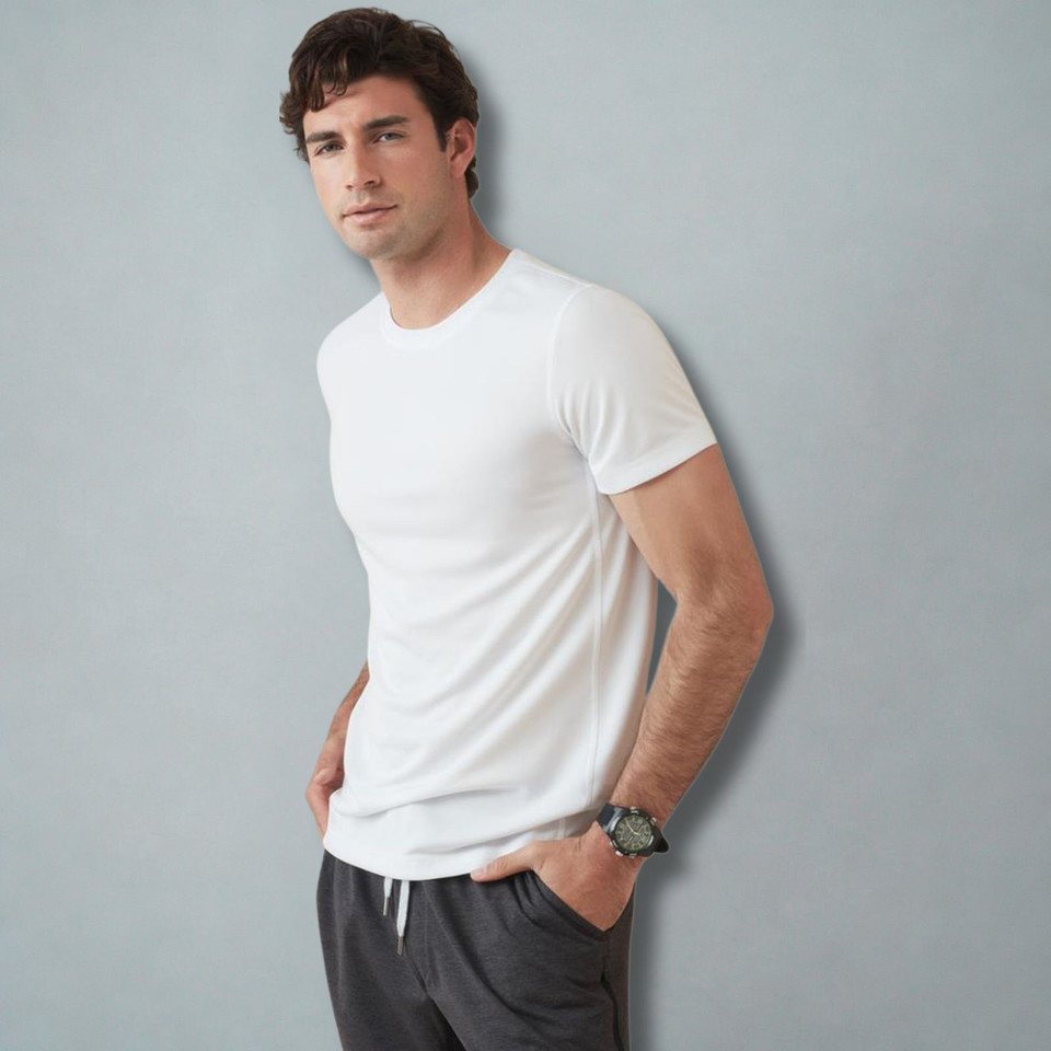 Male model wearing a white slim-fit crew neck T-shirt with short sleeves and smooth fabric finish