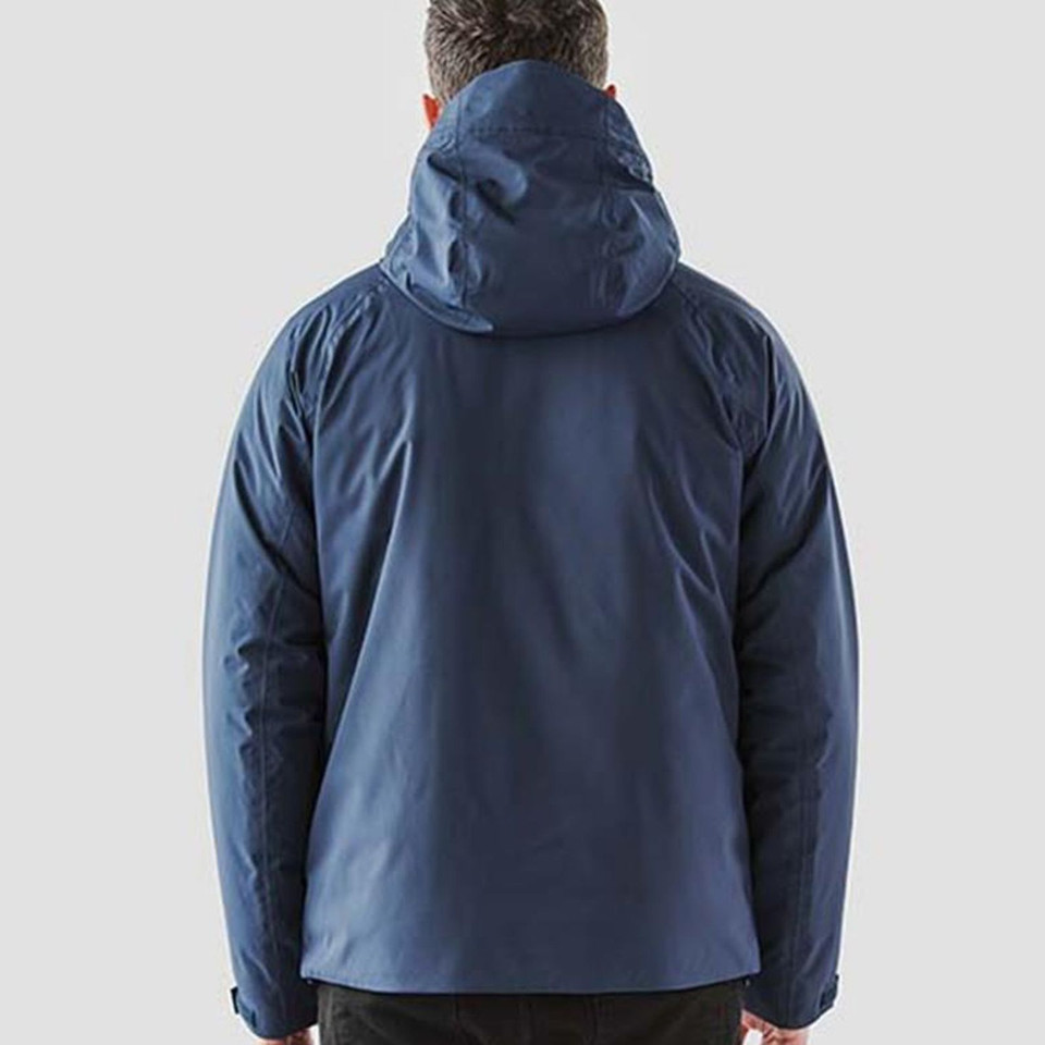 Rear view of man wearing steel blue thermal shell jacket with structured hood and smooth back panel