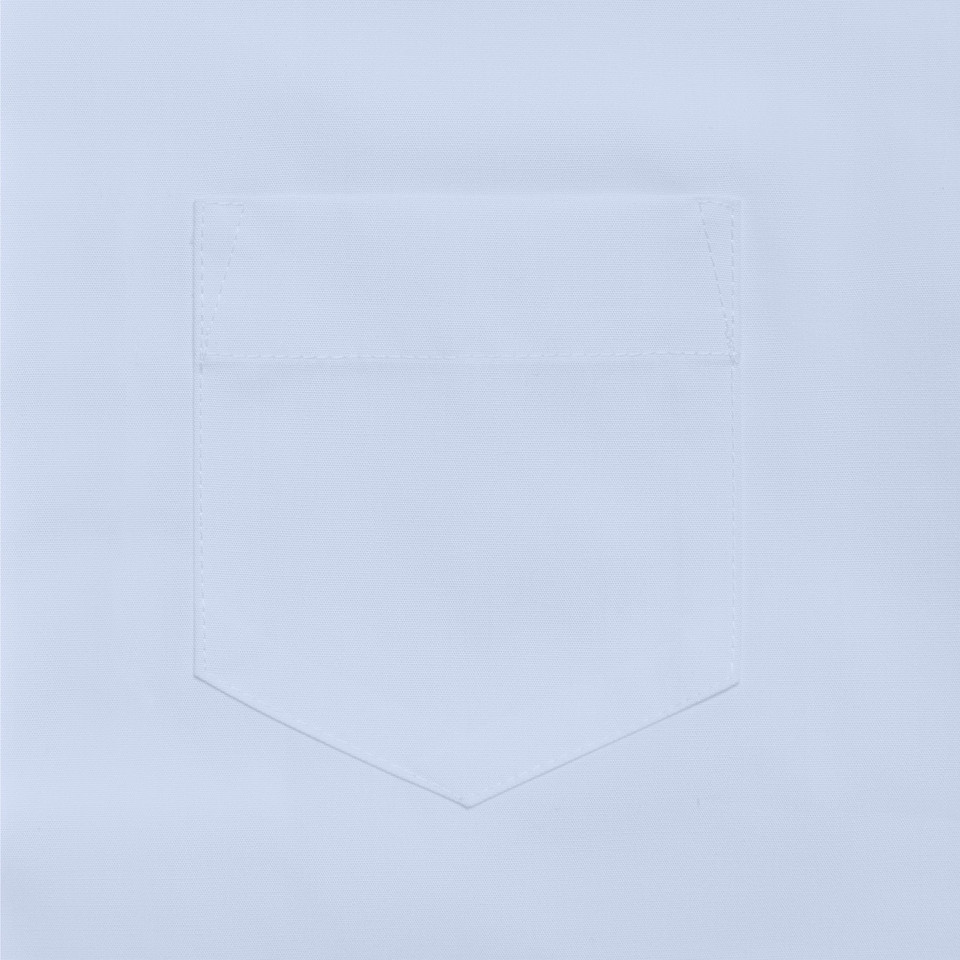 Close-up of chest pocket on pale blue girls long sleeve blouse, smooth fabric with clean stitched edges