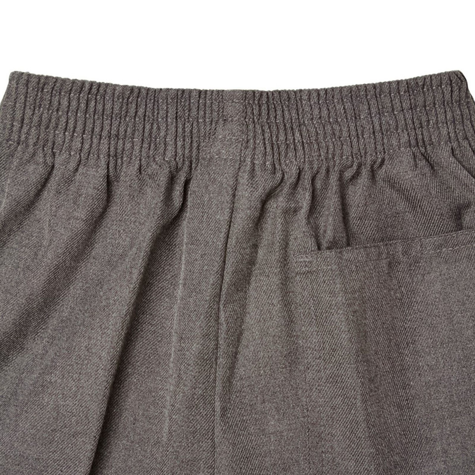 Charcoal grey melange school pants close-up showing elasticated waistband and rear pocket detail