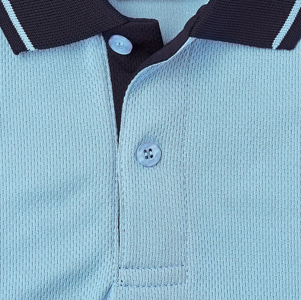 Sky blue textured polo close-up with dark navy contrast collar, twin stripe trim and matching buttons