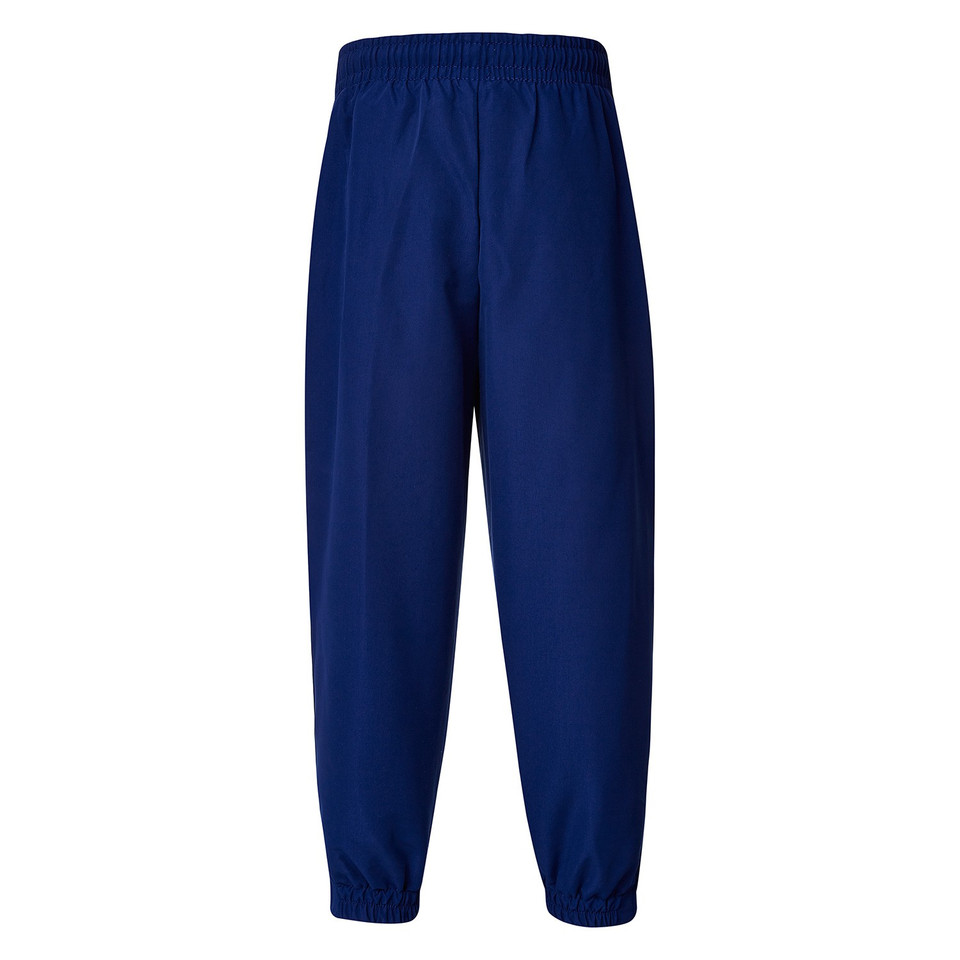 Navy blue microfibre baggy track pants with elasticated waist and zip cuff ankles, rear view packshot