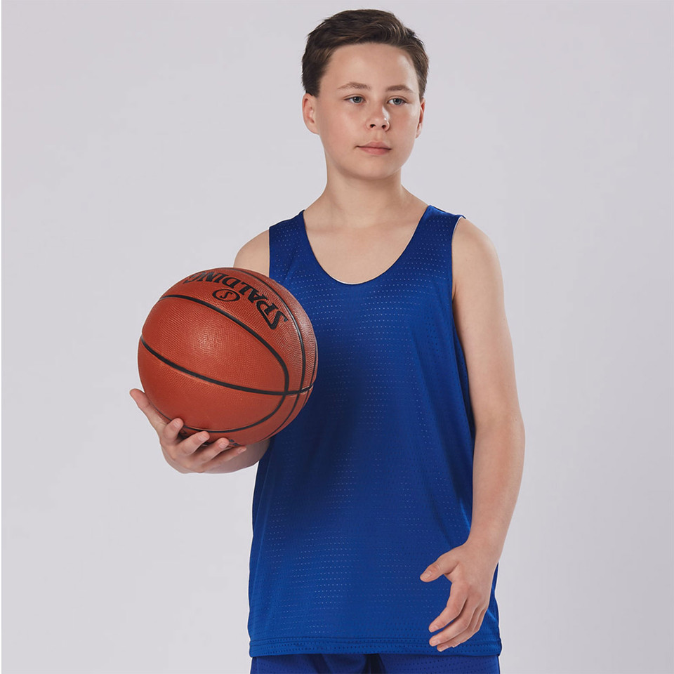 Royal blue reversible basketball singlet with scooped neckline and sleeveless design, youth athletic fit