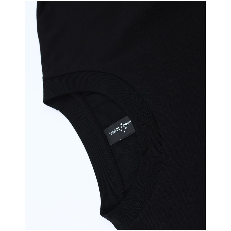 Black unisex heavy cotton oversized tee in boxy relaxed fit - side view