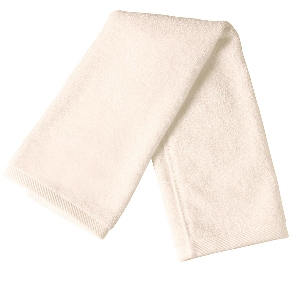 Cream cotton terry hand towel folded flat showing woven border trim at each end