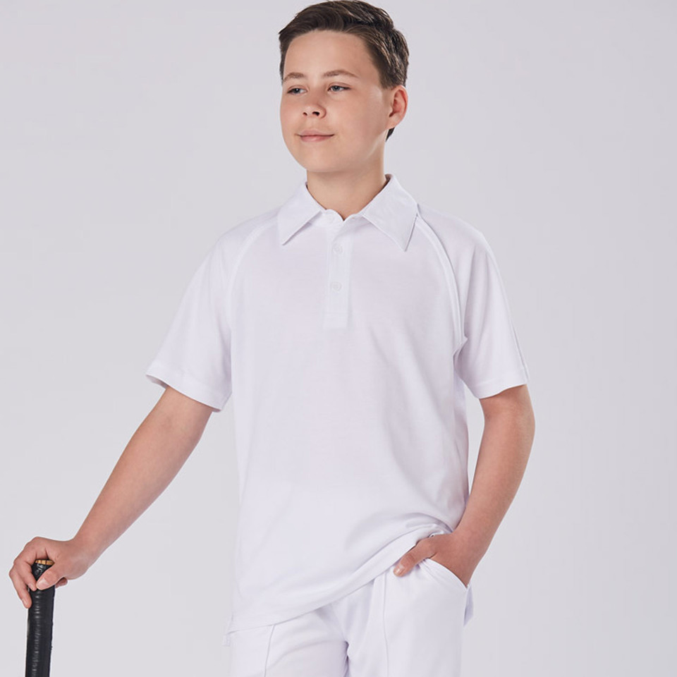 White short sleeve cricket polo shirt with collar and side vents on youth model