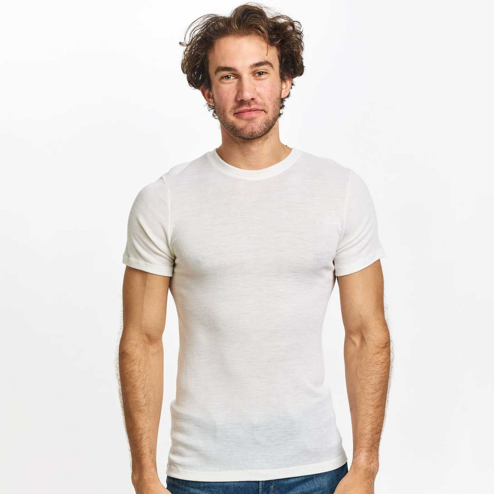 White merino wool short sleeve crew neck t-shirt with smooth flat knit construction and fitted silhouette