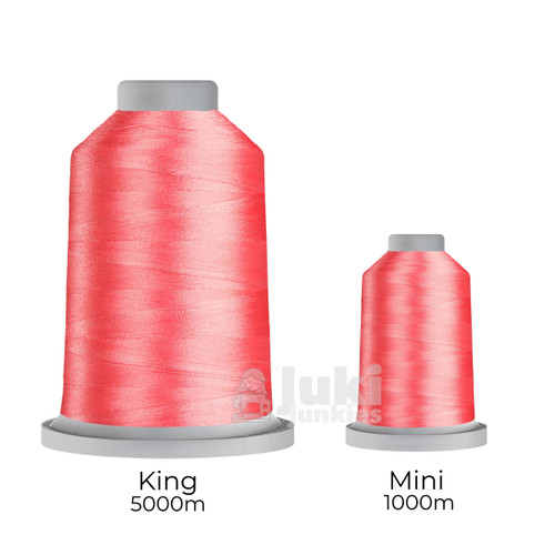 Close-up of two spools of Glide 40 weight polyester thread in Taffy: a large King spool (5,500 yards) and a smaller Mini spool (1,100 yards), shown side by side for size comparison, with a smooth texture and noticeable sheen.