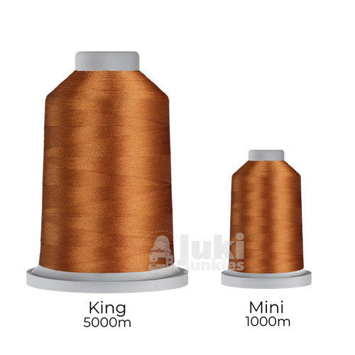 Close-up of two spools of Glide 40 weight polyester thread in Arabian: a large King spool (5,500 yards) and a smaller Mini spool (1,100 yards), shown side by side for size comparison, with a smooth texture and noticeable sheen.