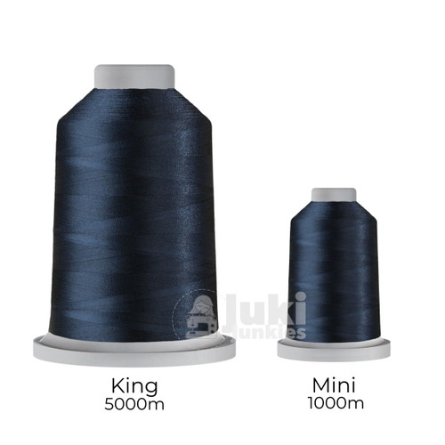 Close-up of two spools of Glide 40 weight polyester thread in Ultra Marine: a large King spool (5,500 yards) and a smaller Mini spool (1,100 yards), shown side by side for size comparison, with a smooth texture and noticeable sheen.