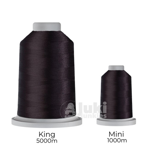 Close-up of two spools of Glide 40 weight polyester thread in Prune: a large King spool (5,500 yards) and a smaller Mini spool (1,100 yards), shown side by side for size comparison, with a smooth texture and noticeable sheen.