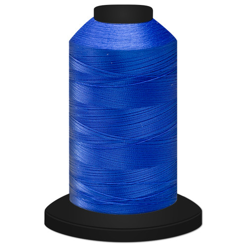 Close-up of a 5,500-yard spool tightly wound with Pacific Glide 60 weight polyester thread, showing its fine, smooth texture and slight sheen.