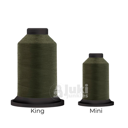 Close-up of two Premo-Soft 50 weight polyester thread spools in Mossy, showing a soft, matte texture. A large King spool (3,000 yards) and a smaller Mini spool (670 yards) are side by side for size comparison.
