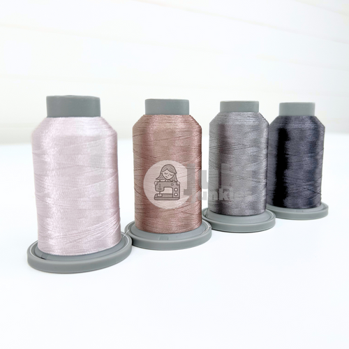 Glide 40 wt thread bundle with four mini 1100-yard spools in Sterling, Medium Grey, Bone, and Warm Grey 6, neutral polyester thread for quilting, sewing, bag making and embroidery