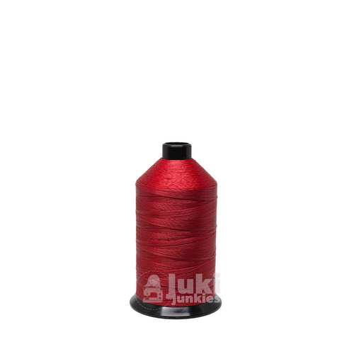 Close-up of a 1,087-yard spool of Premo Bond Tex 90 bonded polyester thread in Red, showing its smooth, glossy finish.