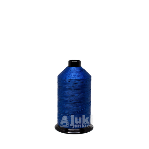 Close-up of a 1,087-yard spool of Premo Bond Tex 90 bonded polyester thread in Marine Blue, showing its smooth, glossy finish.