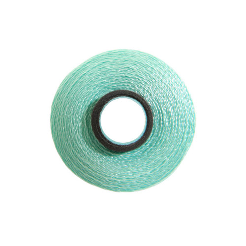 Close-up of a Glide 40 weight polyester thread bobbin in Mint, size L, with 72 yards of thread.