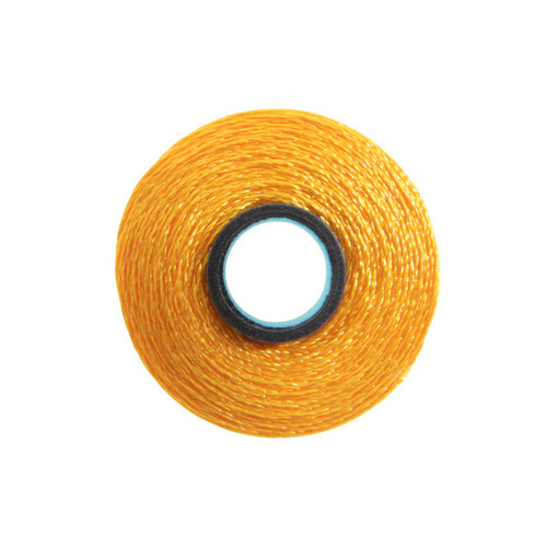 Close-up of a Glide 40 weight polyester thread bobbin in Bright Gold, size L, with 72 yards of thread.