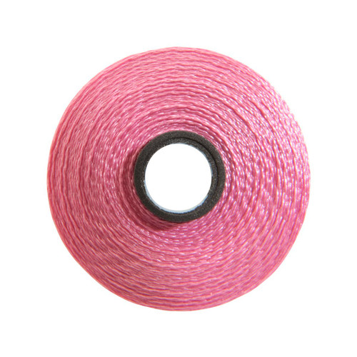 Close-up of a Glide 40 weight polyester thread bobbin in Pink, size M, with 132 yards of thread.